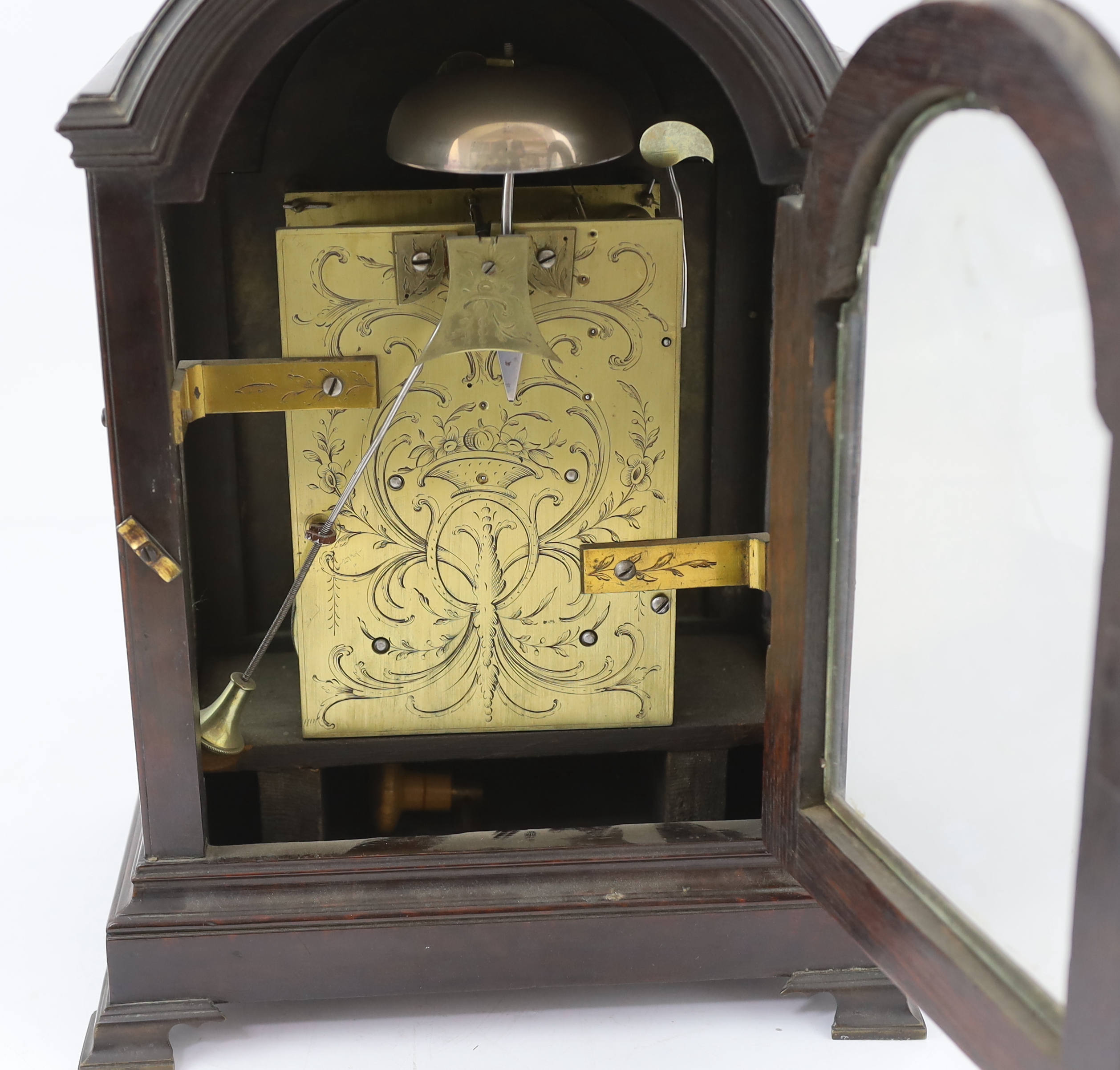 Kentish & Haynes of London, a George III ebonised eight day bracket clock 28.5cm wide, 19.5cm deep, 40cm high